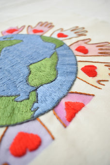 Hand-Embroidered “Hands Around the World” Art – Supporting Peace & Justice | Original & Fine Art Print Available