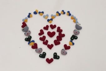 Hand knitted pocket hearts - Made by Ukrainian Artisans