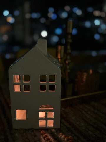 Ceramic House with space for a candle at the back