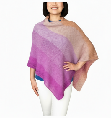 Person wearing a purple and beige gradient shawl on a white background