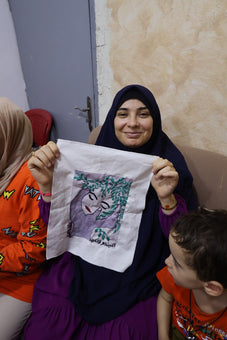 Embroidered "To Be or Not to Be" Women Face and Hands Art by Refugee Women | Joy is Resistance