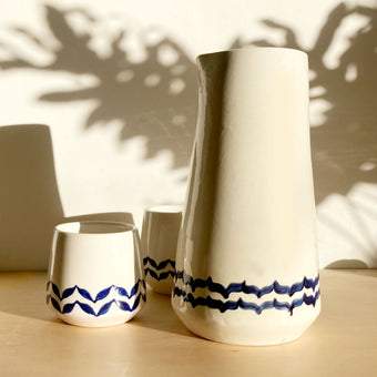 Ceramic carafe and two water tumblers