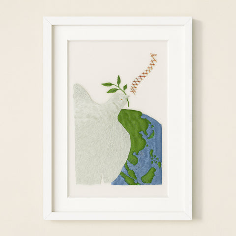 Framed artwork with a dove, olive brand and earth